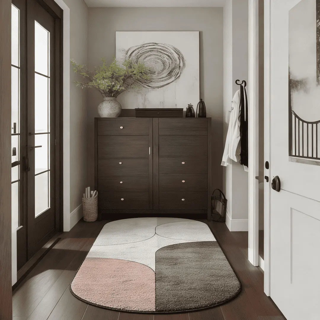 Soft neutral abstract runner rug placed in a modern hallway entryway with warm natural light