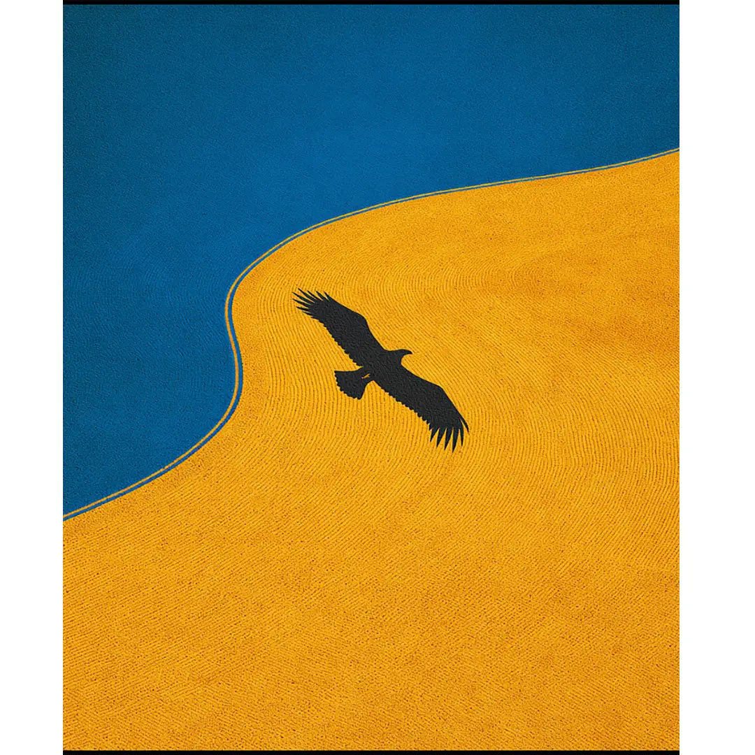Black silhouette of a bird flying over a yellow landscape with a blue sky.