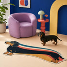 Long Dachshund personality rug displayed with a black and tan Dachshund in a colorful reading nook