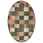Irregular earthy green and beige rug balcony nook