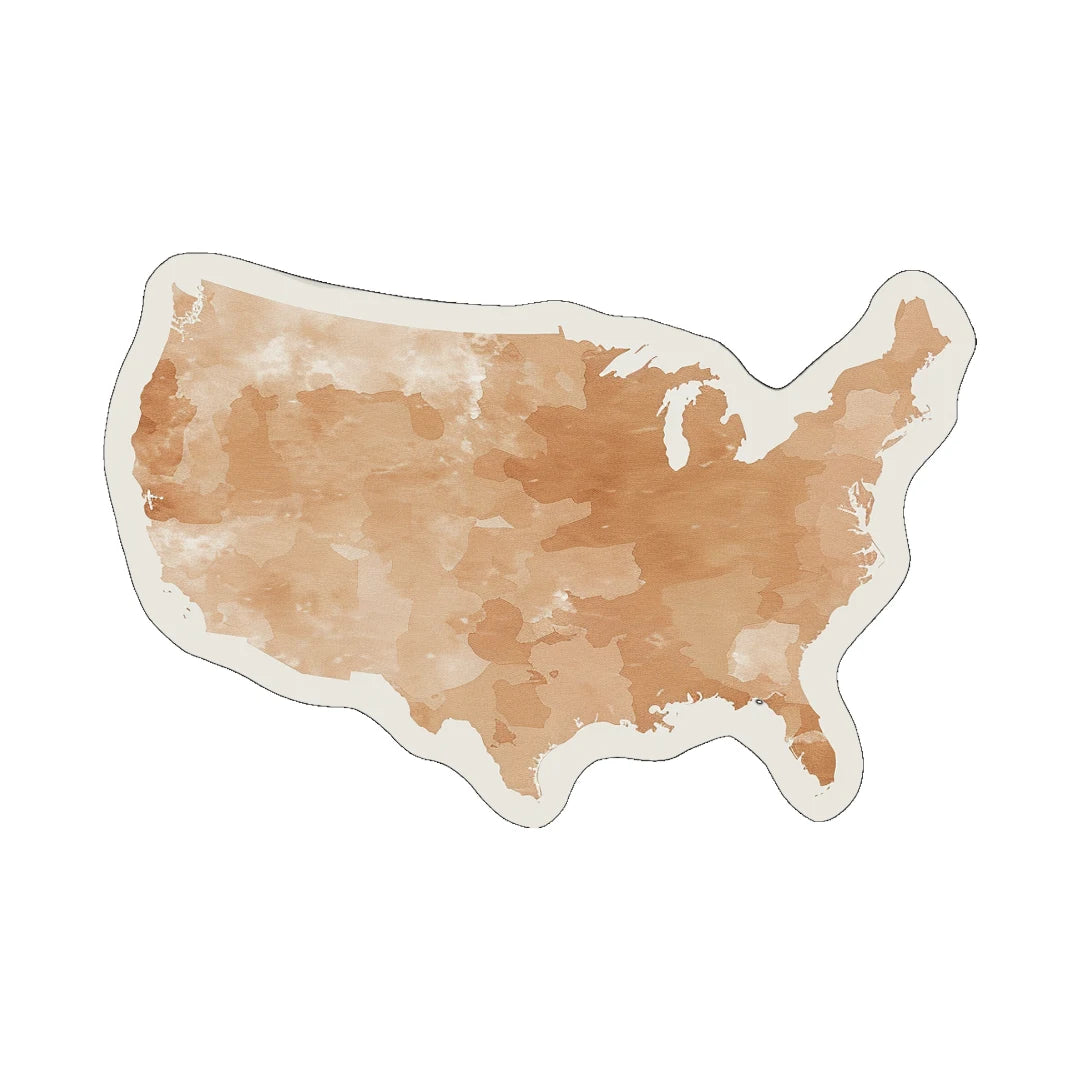 Abstract earth-toned irregular rug placed in a cozy living room with plants, soft seating, and natural light