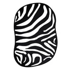 Irregular black and white zebra pattern rug with organic wavy stripe design