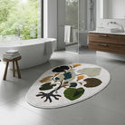 Floral botanical rug placed in a modern bathroom with a freestanding bathtub, soft natural light, and spa-inspired decor